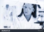 stock-photo-scientists-researching-in-scientific-laboratory-young-female-young-phd-student-scientist-1009058353.jpg