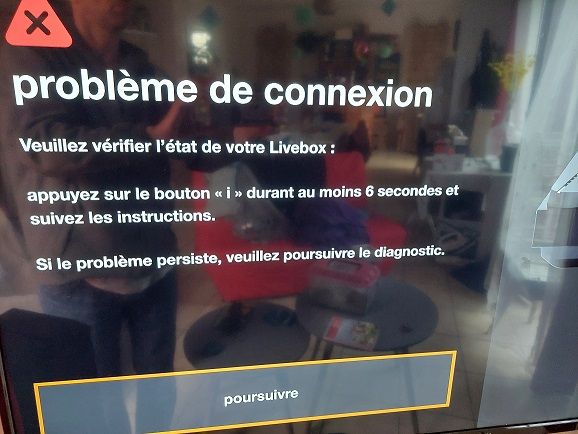 Appuyer sur le bouton "i" qui n'existe pas sur la Livebox 5